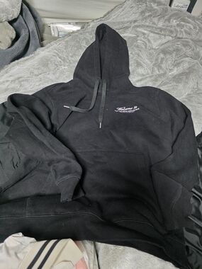 H&M Black Hoodie with Small White Chest Script